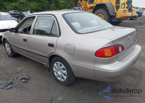 2001 Toyota Corolla Ce z USA, uszkodzony, nr VIN 2T1BR12EX1C416688